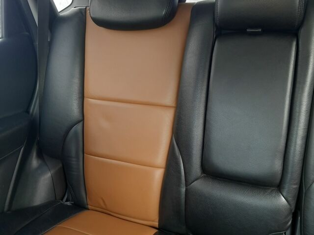 Черный Хендай Туксон, объемом двигателя 2 л и пробегом 230 тыс. км за 7000 $, фото 1 на Automoto.ua