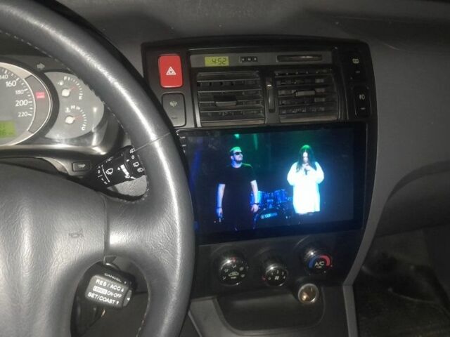 Черный Хендай Туксон, объемом двигателя 2 л и пробегом 500 тыс. км за 6500 $, фото 1 на Automoto.ua