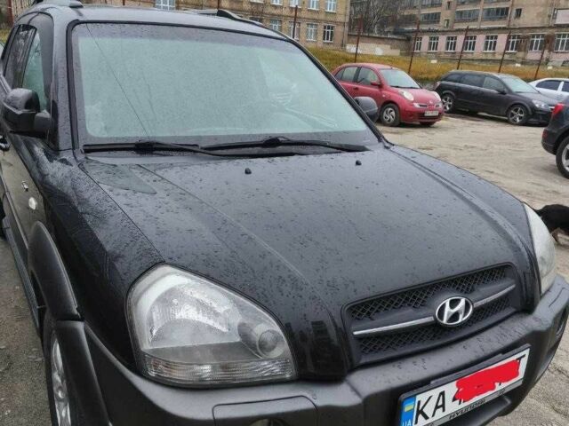 Черный Хендай Туксон, объемом двигателя 2 л и пробегом 180 тыс. км за 8300 $, фото 1 на Automoto.ua