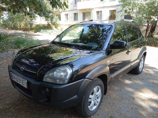 Чорний Хендай Туксон, об'ємом двигуна 2 л та пробігом 255 тис. км за 8500 $, фото 1 на Automoto.ua