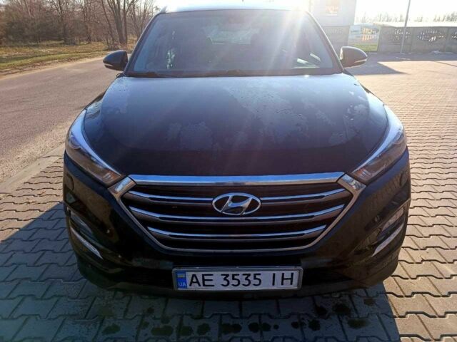 Черный Хендай Туксон, объемом двигателя 2 л и пробегом 148 тыс. км за 17800 $, фото 1 на Automoto.ua