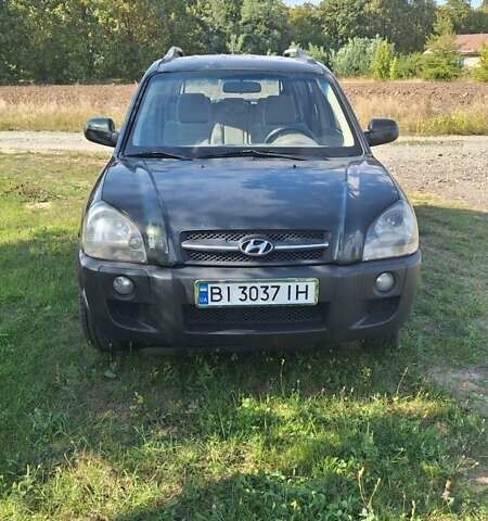 Черный Хендай Туксон, объемом двигателя 2 л и пробегом 240 тыс. км за 7300 $, фото 1 на Automoto.ua