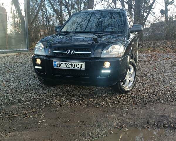 Черный Хендай Туксон, объемом двигателя 2 л и пробегом 236 тыс. км за 6000 $, фото 1 на Automoto.ua