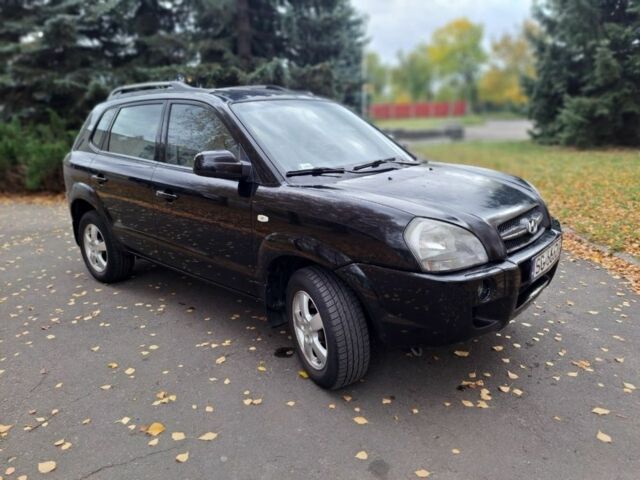 Черный Хендай Туксон, объемом двигателя 2 л и пробегом 280 тыс. км за 3250 $, фото 1 на Automoto.ua