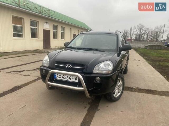 Черный Хендай Туксон, объемом двигателя 2 л и пробегом 190 тыс. км за 7500 $, фото 1 на Automoto.ua