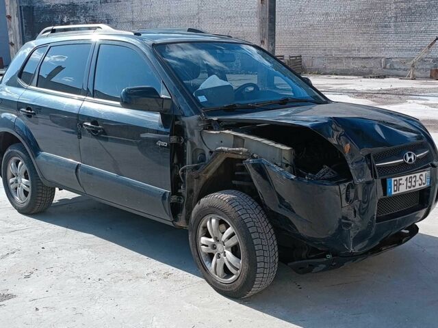 Черный Хендай Туксон, объемом двигателя 2 л и пробегом 240 тыс. км за 5000 $, фото 1 на Automoto.ua