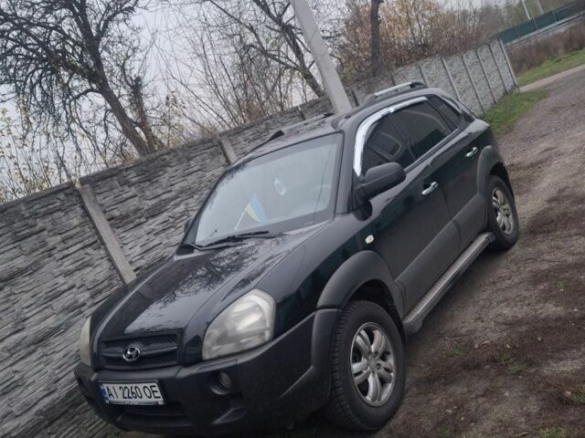 Черный Хендай Туксон, объемом двигателя 2 л и пробегом 224 тыс. км за 6800 $, фото 1 на Automoto.ua