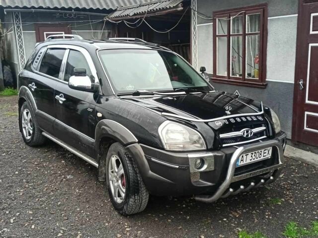 Чорний Хендай Туксон, об'ємом двигуна 2 л та пробігом 260 тис. км за 6800 $, фото 1 на Automoto.ua