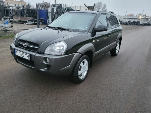 Черный Хендай Туксон, объемом двигателя 2 л и пробегом 180 тыс. км за 4500 $, фото 1 на Automoto.ua