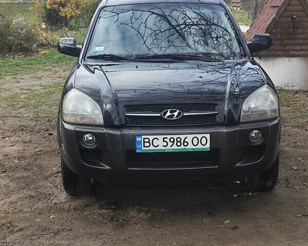 Черный Хендай Туксон, объемом двигателя 2 л и пробегом 299 тыс. км за 6000 $, фото 1 на Automoto.ua