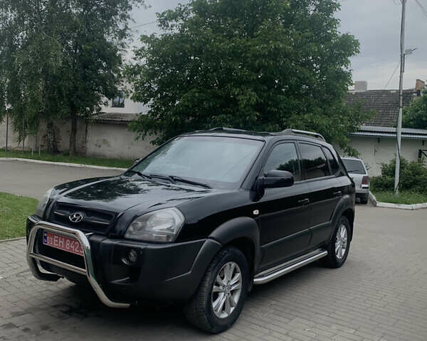 Черный Хендай Туксон, объемом двигателя 2 л и пробегом 270 тыс. км за 6300 $, фото 1 на Automoto.ua