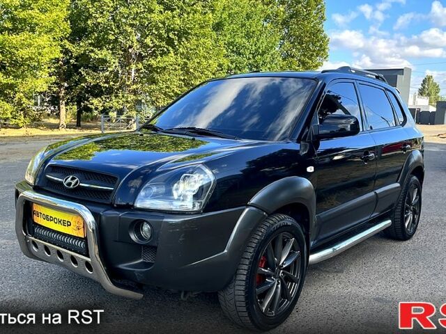 Черный Хендай Туксон, объемом двигателя 2 л и пробегом 241 тыс. км за 7800 $, фото 1 на Automoto.ua
