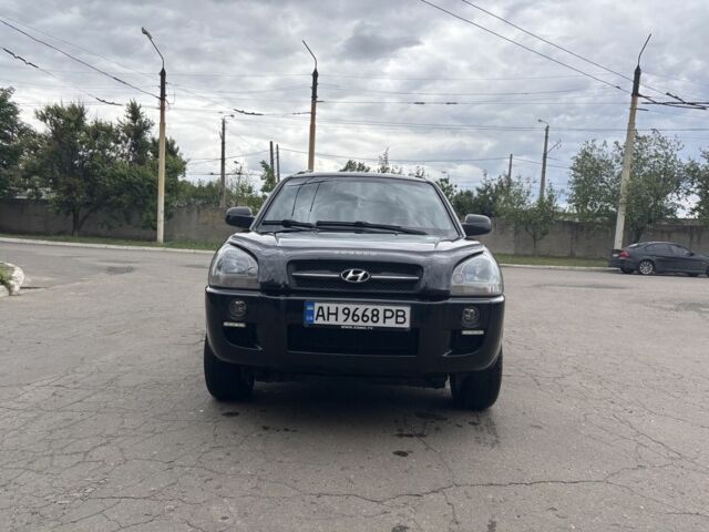 Чорний Хендай Туксон, об'ємом двигуна 2 л та пробігом 208 тис. км за 8600 $, фото 1 на Automoto.ua