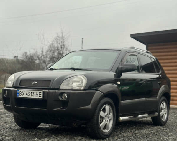 Черный Хендай Туксон, объемом двигателя 2 л и пробегом 257 тыс. км за 6800 $, фото 1 на Automoto.ua
