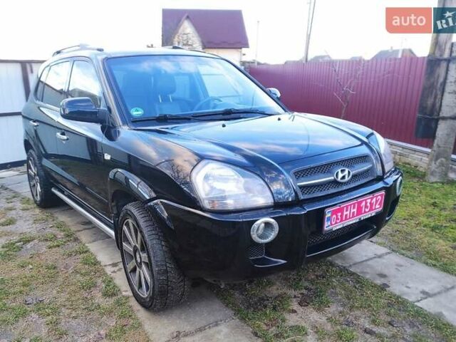 Черный Хендай Туксон, объемом двигателя 2 л и пробегом 208 тыс. км за 6900 $, фото 1 на Automoto.ua