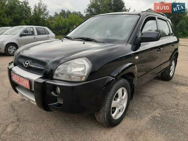 Черный Хендай Туксон, объемом двигателя 2 л и пробегом 216 тыс. км за 7600 $, фото 1 на Automoto.ua