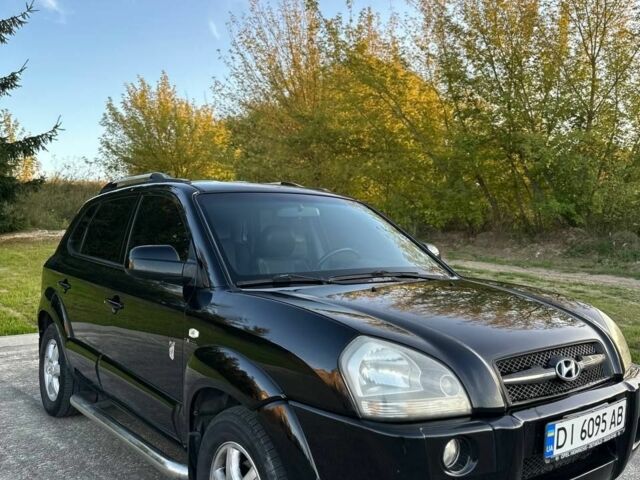 Чорний Хендай Туксон, об'ємом двигуна 2 л та пробігом 235 тис. км за 6700 $, фото 1 на Automoto.ua