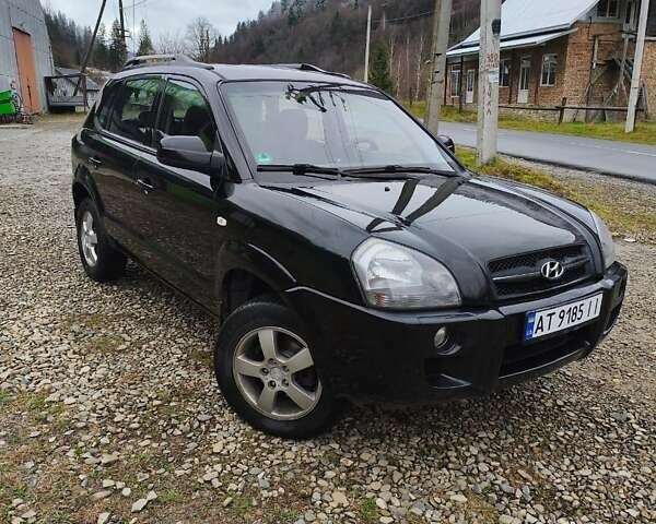 Чорний Хендай Туксон, об'ємом двигуна 2 л та пробігом 271 тис. км за 6599 $, фото 1 на Automoto.ua