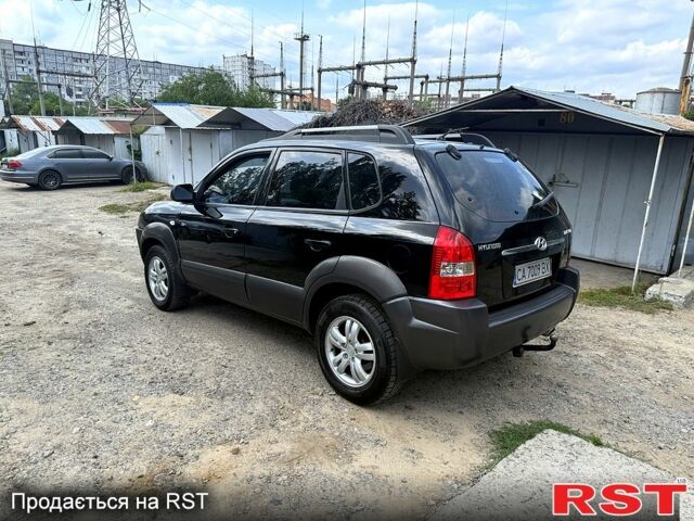 Чорний Хендай Туксон, об'ємом двигуна 2 л та пробігом 254 тис. км за 7650 $, фото 1 на Automoto.ua