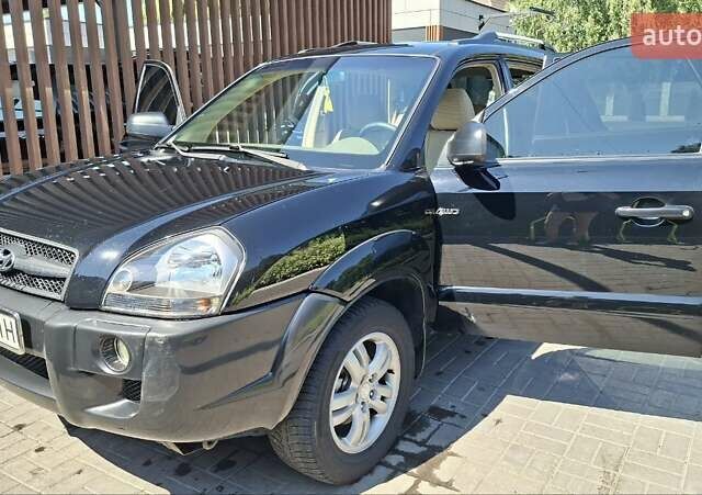 Чорний Хендай Туксон, об'ємом двигуна 2.7 л та пробігом 265 тис. км за 8300 $, фото 1 на Automoto.ua