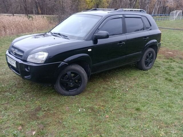 Чорний Хендай Туксон, об'ємом двигуна 2 л та пробігом 220 тис. км за 8300 $, фото 1 на Automoto.ua