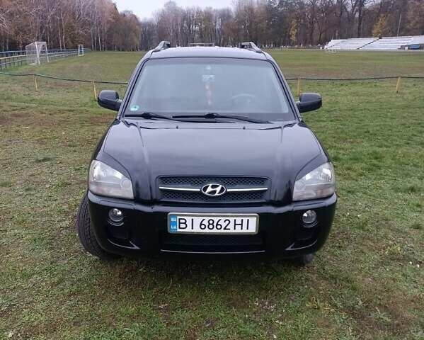 Черный Хендай Туксон, объемом двигателя 2 л и пробегом 220 тыс. км за 8300 $, фото 1 на Automoto.ua