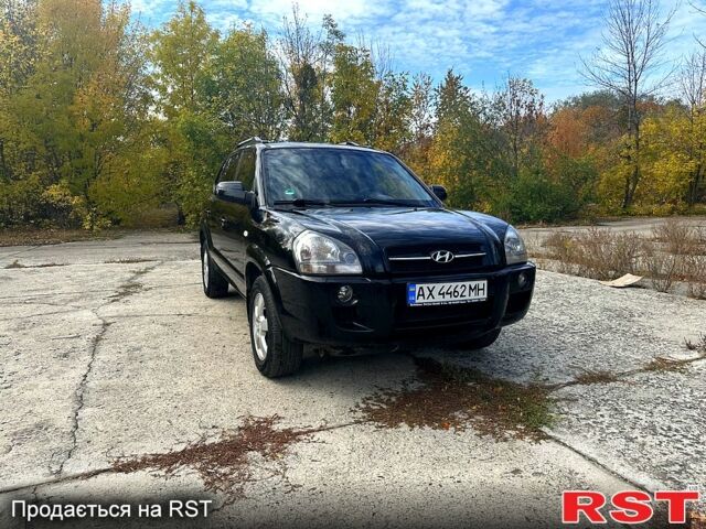 Черный Хендай Туксон, объемом двигателя 2 л и пробегом 250 тыс. км за 7500 $, фото 1 на Automoto.ua
