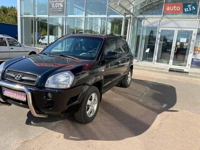 Чорний Хендай Туксон, об'ємом двигуна 2 л та пробігом 230 тис. км за 7300 $, фото 1 на Automoto.ua