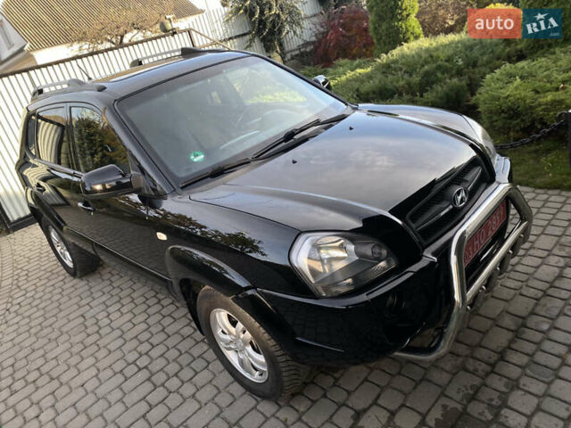 Чорний Хендай Туксон, об'ємом двигуна 1.98 л та пробігом 233 тис. км за 7650 $, фото 1 на Automoto.ua