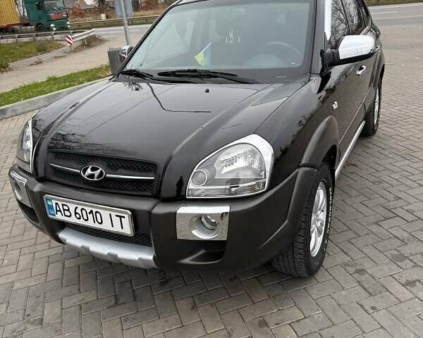 Чорний Хендай Туксон, об'ємом двигуна 2 л та пробігом 124 тис. км за 7950 $, фото 1 на Automoto.ua