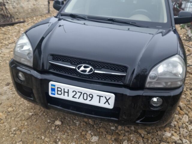 Черный Хендай Туксон, объемом двигателя 2 л и пробегом 230 тыс. км за 6800 $, фото 1 на Automoto.ua