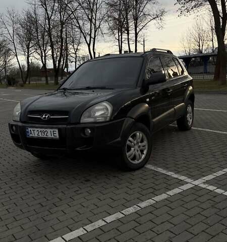 Черный Хендай Туксон, объемом двигателя 1.99 л и пробегом 334 тыс. км за 6300 $, фото 1 на Automoto.ua