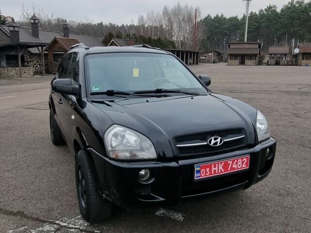 Чорний Хендай Туксон, об'ємом двигуна 2 л та пробігом 190 тис. км за 6999 $, фото 1 на Automoto.ua