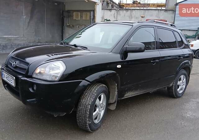 Чорний Хендай Туксон, об'ємом двигуна 1.98 л та пробігом 320 тис. км за 6500 $, фото 1 на Automoto.ua