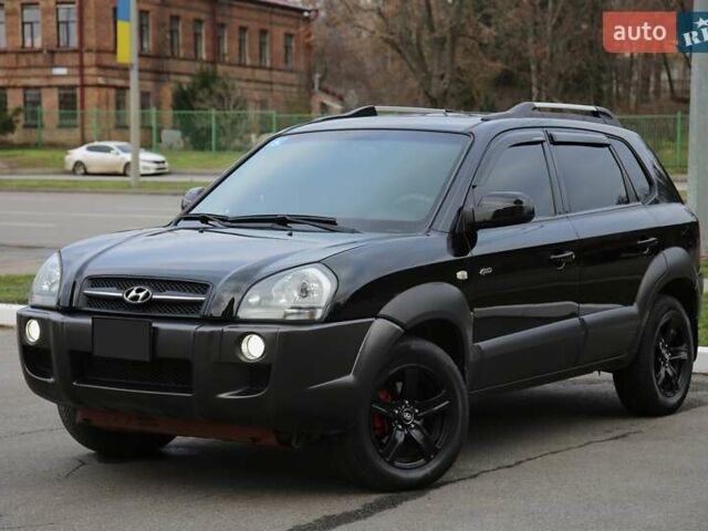 Черный Хендай Туксон, объемом двигателя 2.66 л и пробегом 217 тыс. км за 8600 $, фото 1 на Automoto.ua