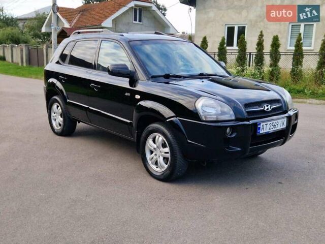 Черный Хендай Туксон, объемом двигателя 2 л и пробегом 215 тыс. км за 8850 $, фото 1 на Automoto.ua