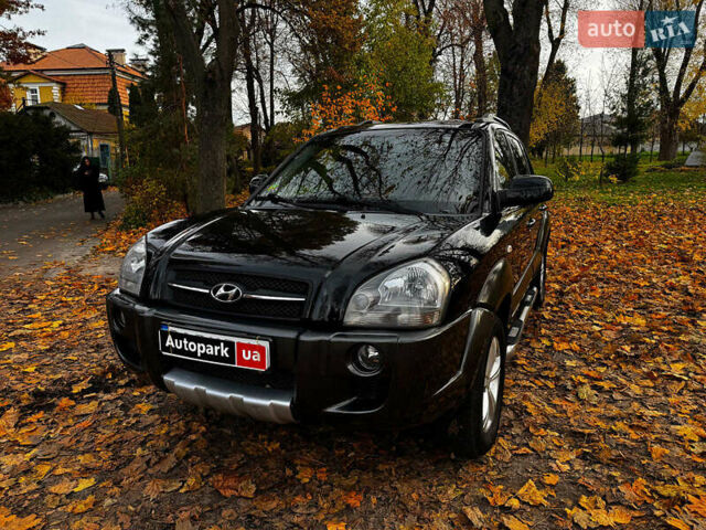 Черный Хендай Туксон, объемом двигателя 2 л и пробегом 210 тыс. км за 7990 $, фото 1 на Automoto.ua