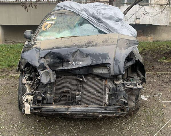 Черный Хендай Туксон, объемом двигателя 2 л и пробегом 180 тыс. км за 2000 $, фото 1 на Automoto.ua