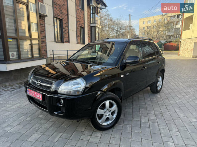 Черный Хендай Туксон, объемом двигателя 2 л и пробегом 249 тыс. км за 7450 $, фото 1 на Automoto.ua