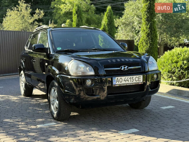 Черный Хендай Туксон, объемом двигателя 2 л и пробегом 192 тыс. км за 6950 $, фото 1 на Automoto.ua