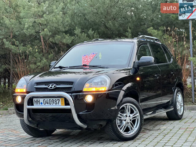 Чорний Хендай Туксон, об'ємом двигуна 1.98 л та пробігом 170 тис. км за 6999 $, фото 1 на Automoto.ua