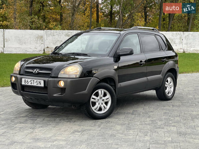 Черный Хендай Туксон, объемом двигателя 2 л и пробегом 216 тыс. км за 7700 $, фото 1 на Automoto.ua