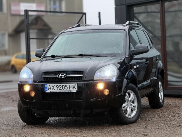 Черный Хендай Туксон, объемом двигателя 2 л и пробегом 263 тыс. км за 7950 $, фото 1 на Automoto.ua