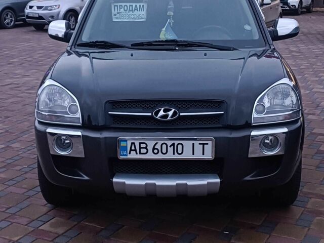 Черный Хендай Туксон, объемом двигателя 2 л и пробегом 124 тыс. км за 7200 $, фото 1 на Automoto.ua
