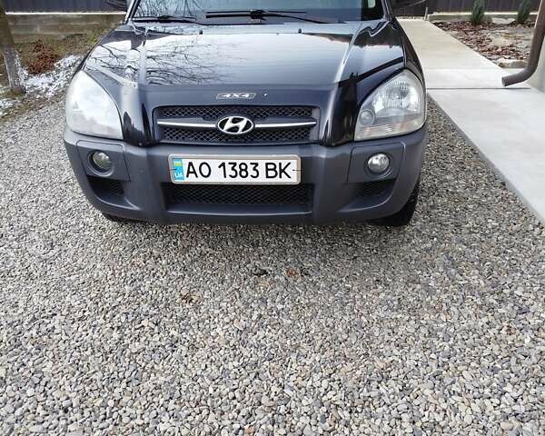 Черный Хендай Туксон, объемом двигателя 2.7 л и пробегом 290 тыс. км за 7300 $, фото 1 на Automoto.ua