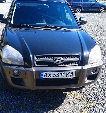 Чорний Хендай Туксон, об'ємом двигуна 1.98 л та пробігом 283 тис. км за 7400 $, фото 1 на Automoto.ua