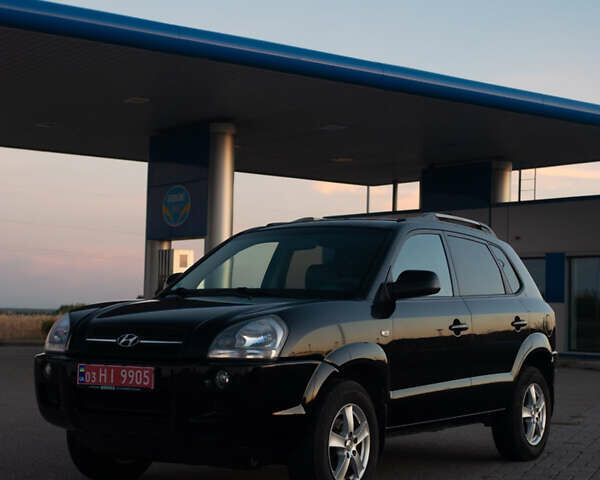 Черный Хендай Туксон, объемом двигателя 2 л и пробегом 167 тыс. км за 7800 $, фото 1 на Automoto.ua