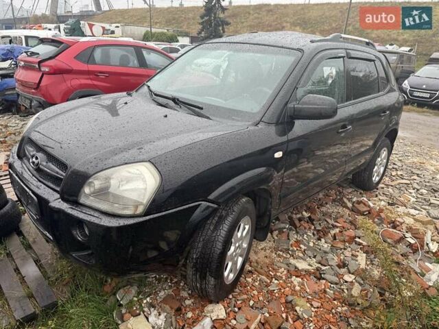 Черный Хендай Туксон, объемом двигателя 2 л и пробегом 151 тыс. км за 3500 $, фото 1 на Automoto.ua