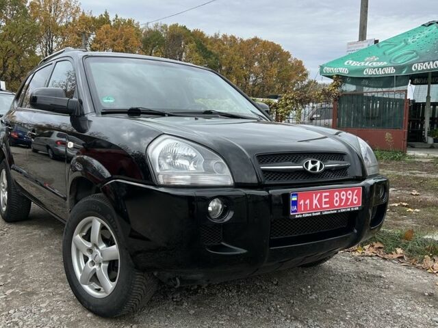 Черный Хендай Туксон, объемом двигателя 2 л и пробегом 159 тыс. км за 8650 $, фото 1 на Automoto.ua