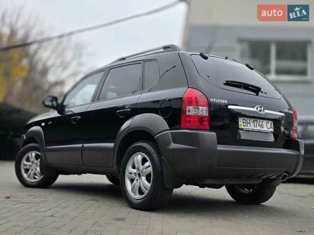 Чорний Хендай Туксон, об'ємом двигуна 1.98 л та пробігом 123 тис. км за 7950 $, фото 1 на Automoto.ua
